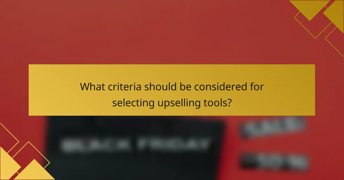 What criteria should be considered for selecting upselling tools?